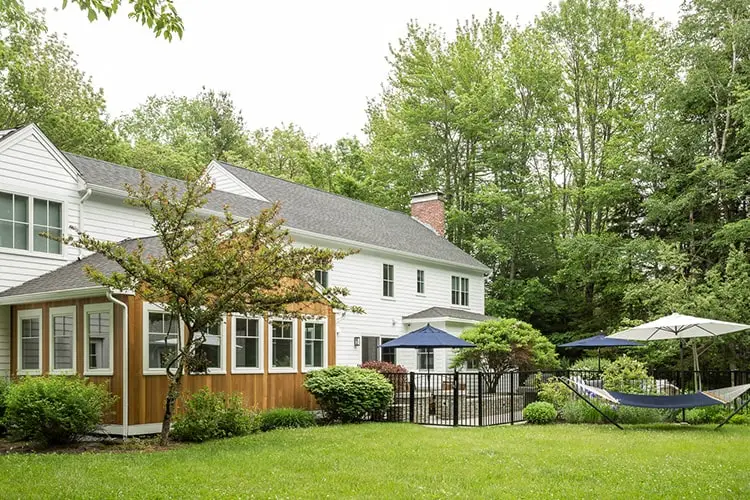 Primary suite addition from the backyard – Acorn Lane Colonial, Scarborough, Maine