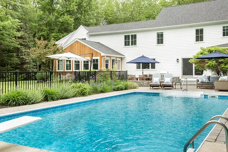 Pool and rear elevation – Acorn Lane Colonial, Scarborough, Maine