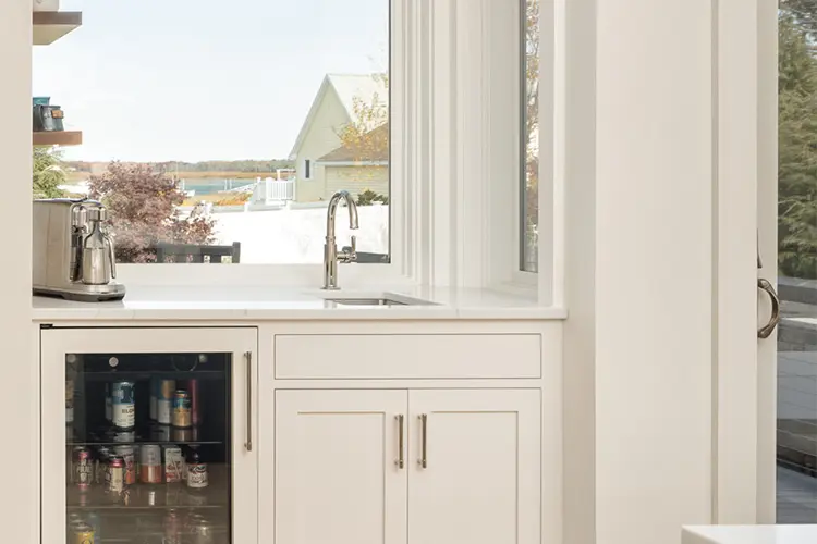 Bedroom opening to a balcony – Driftwood Lane, Pine Point Beach, Maine