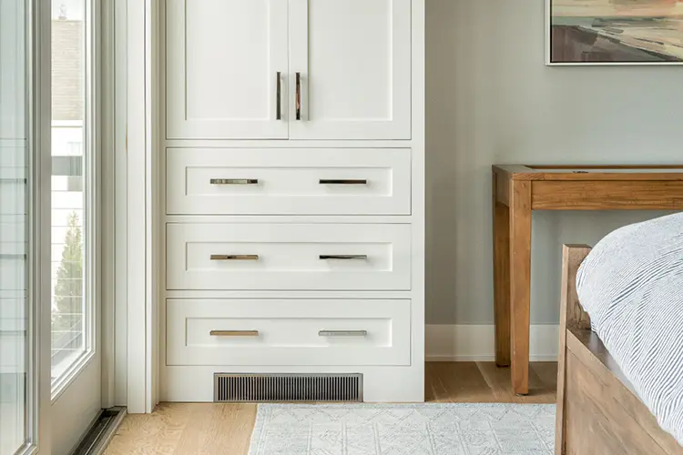 White kitchen with blue island and pendants – Driftwood Lane, Pine Point Beach, Maine