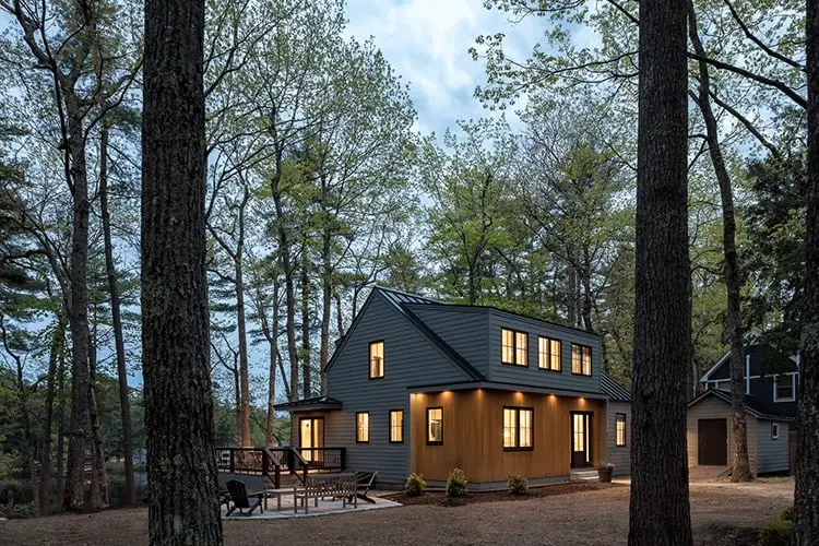 Lakeside deck at dusk among the pines – Lake House project, Windham, Maine