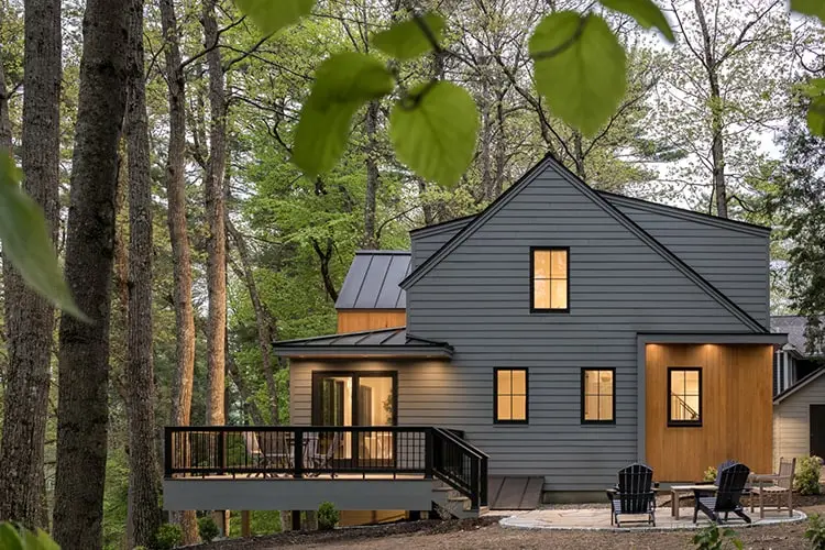 Exterior among tall pines – Lake House, Windham, Maine
