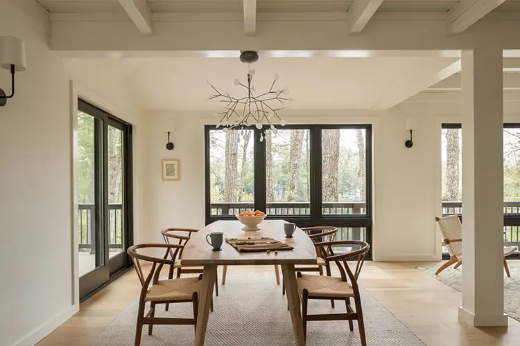 Dining room with original post-and-beam framing – Lake House project, Windham, Maine