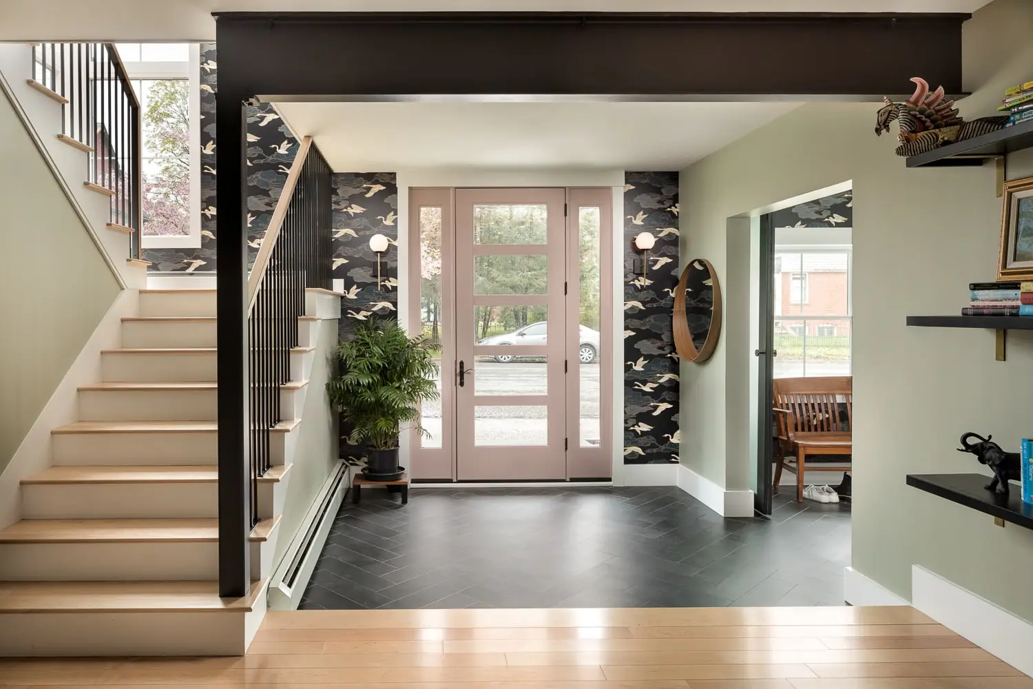 Second-story living room with custom fireplace in a renovated West End home, Portland, Maine